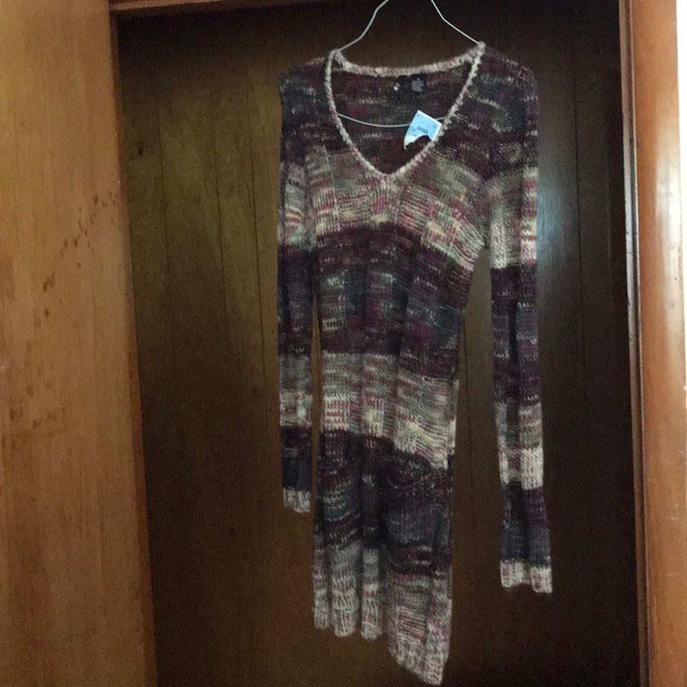 A striped patterned sweater dress